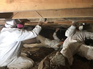 Technicians Repairing A Roof After A Storm